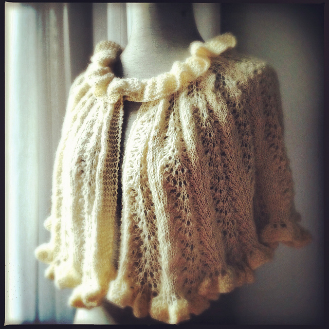 Candy knitted her very own wedding capelet!  :-)