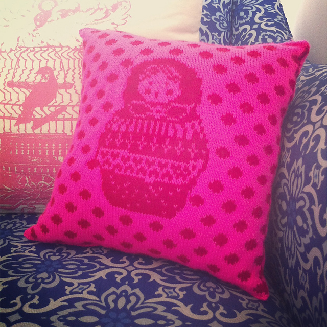 A knitted matryoshka pillow!